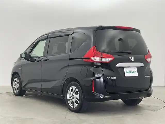 ホンダ フリード ハイブリット G ホンダセンシング 富山県 2020(令2)年 4.9万km クリスタルブラックパール 純正ナビ（AM/FM/DVD/BT/フルセグ）/バックカメラ/ETC/両側パワースライドドア/シートヒーター/衝突被害軽減システム/レーダークルーズコントロール/レーンキープアシスト/横滑り防止装置/アイドリングストップ/オートLEDライト/純正フロアマット/スマートキー/スペアキー