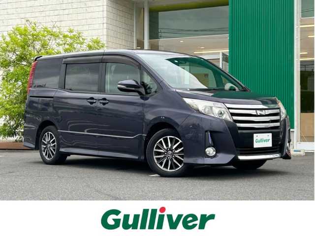 トヨタ ノア Si 岡山県 2016(平28)年 7.8万km ダークバイオレットマイカメタリック アルパイン７インチナビ/-ＣＤ/-ＤＶＤ/-ＢＴ/-フルセグＴＶ/バックカメラ/ＥＴＣ/両側パワースライドドア/オートライト/ＭＴモード付ＡＴ/トヨタセーフティセンス/ドアバイザー/フォグランプ