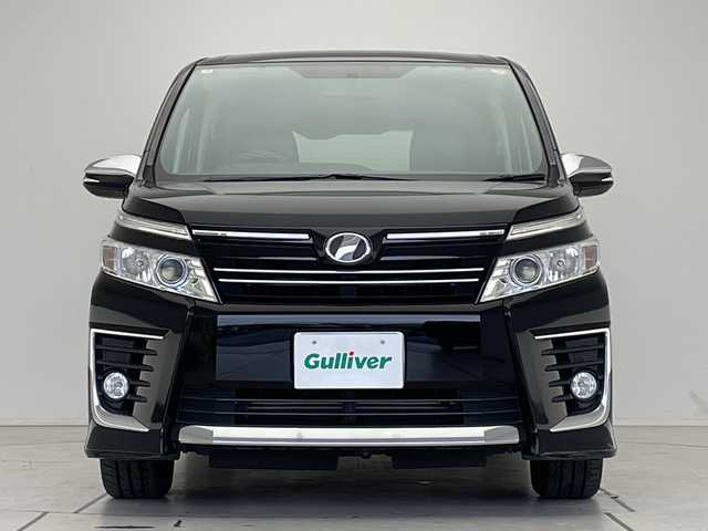 トヨタ ヴォクシー ZS 煌 愛知県 2015(平27)年 7.1万km ブラック 純正9型ナビ/フリップダウンモニター/両側パワースライドドア/バックカメラ/純正アルミホイール/LEDヘッドライト/オートライト/ETC/フルセグ/CD DVD/Bluetooth/ステアリングスイッチ/スマートキー/プッシュスタート