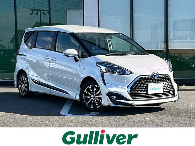 トヨタ シエンタ ハイブリッド ファンベースG 岐阜県 2018(平30)年 3.1万km パール 登録時走行距離31029km/純正SDナビ/フルセグ/バックモニター/モデリスタフルエアロ/シートヒーター/ステアリングヒーター/クルーズコントロール/ドライブレコーダー/ETC/USB/Bluetooth/純正フロアマット/社外ラバーマット