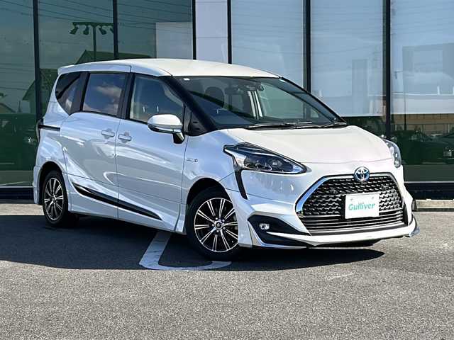 トヨタ シエンタ ハイブリッド ファンベースG 岐阜県 2018(平30)年 3.1万km パール 登録時走行距離31029km/純正SDナビ/フルセグ/バックモニター/モデリスタフルエアロ/シートヒーター/ステアリングヒーター/クルーズコントロール/ドライブレコーダー/ETC/USB/Bluetooth/純正フロアマット/社外ラバーマット