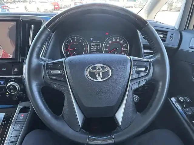トヨタ アルファード S Cパッケージ 岡山県 2018(平30)年 8.3万km ホワイトパールクリスタルシャイン 登録時走行距離82439km/ワンオーナー/純正9インチナビ/フルセグTV(AM/FM/CD/DVD/Bluetooth)/純正12.1インチフリップダウンモニター/バックカメラ/両側パワースライドドア/ビルトインETC2.0/ドライブレコーダー/パワーバックドア/トヨタセーフティセンス/・プリクラッシュセーフティ/・レーダークルーズコントロール/・オートマチックハイビーム/・レーンディバーチャーアラート/オートブレーキホールド/横滑り防止装置/D/N席シートヒーター/D/N席ベンチレーション/ステアリングヒーター/オットマン/18インチ純正AW/社外フロアマット