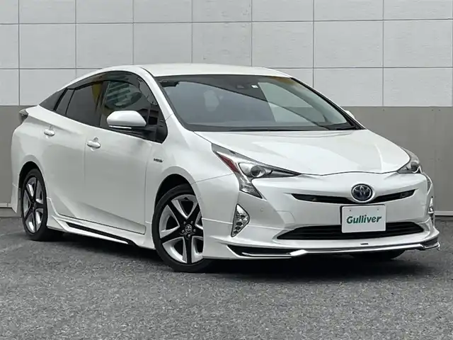 トヨタ プリウス A ツーリングセレクション 東京都 2016(平28)年 2.3万km ホワイトパールクリスタルシャイン モデリスタフロントスポイラー/モデリスタサイドスカート/モデリスタリアスカート/純正９インチSDナビ/CD/DVD/FM・AM/SD/Bluetooth//フルセグTV/バックカメラ/ETC/ヘッドアップディスプレイ/パーキングアシスト/プリクラッシュセーフティ/レーンキープアシスト/レーダークルーズコントロール/オートハイビーム/クリアランスソナー/ブラインドスポットモニター/シートヒーター/純正17インチアルミホイール/純正フロアマット/LEDヘッドライト/保証書/取扱説明書/スペアキー