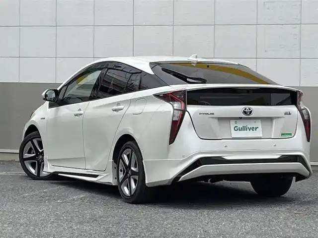 トヨタ プリウス A ツーリングセレクション 東京都 2016(平28)年 2.3万km ホワイトパールクリスタルシャイン モデリスタフロントスポイラー/モデリスタサイドスカート/モデリスタリアスカート/純正９インチSDナビ/CD/DVD/FM・AM/SD/Bluetooth//フルセグTV/バックカメラ/ETC/ヘッドアップディスプレイ/パーキングアシスト/プリクラッシュセーフティ/レーンキープアシスト/レーダークルーズコントロール/オートハイビーム/クリアランスソナー/ブラインドスポットモニター/シートヒーター/純正17インチアルミホイール/純正フロアマット/LEDヘッドライト/保証書/取扱説明書/スペアキー