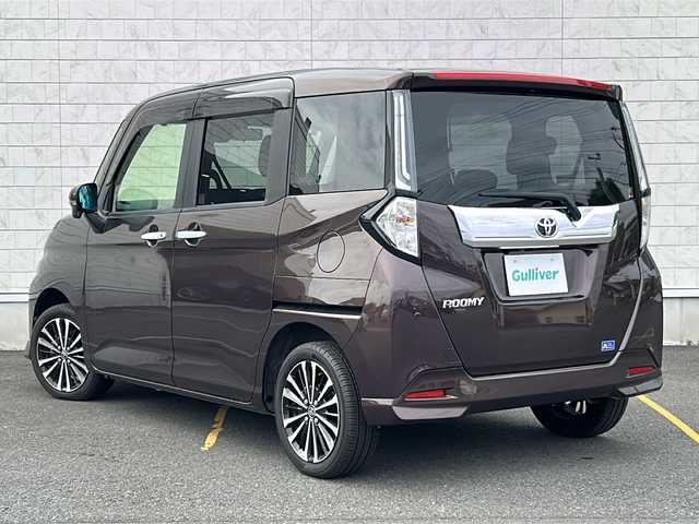 トヨタ ルーミー カスタムG－T 茨城県 2021(令3)年 2.1万km プラムブラウンパールクリスタルシャイン 純正ディスプレイオーディオ/バックカメラ/パノラミックビューモニター/両側パワースライドドア/スマートアシスト/衝突回避支援ブレーキ/衝突警報機能/アダブティブクルーズコントロール/レーンキープアシスト/純正15インチAW/LEDオートライト/オートマチックハイビーム/社外フロアマット/ビルトインETC/ステアリングリモコン/前後ドライブレコーダー/スマートキー/プッシュスタート/取扱説明書