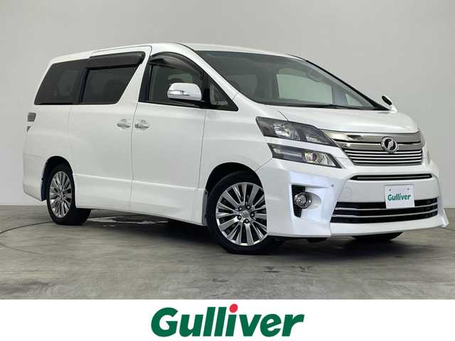 トヨタ ヴェルファイア 2．4Z ゴールデンアイズ 群馬県 2013(平25)年 8万km ホワイトパールクリスタルシャイン フリップダウンモニター　純正８インチナビ　バックカメラ　両側パワースライドドア　クルーズコントロール　ＨＩＤオートライト　ハーフレザーシート　オットマン　パワーバックドア　スマートキー　ＥＴＣ　禁煙車