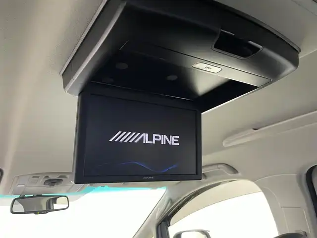 トヨタ ヴェルファイア 2．4Z ゴールデンアイズ 群馬県 2013(平25)年 8万km ホワイトパールクリスタルシャイン フリップダウンモニター　純正８インチナビ　バックカメラ　両側パワースライドドア　クルーズコントロール　ＨＩＤオートライト　ハーフレザーシート　オットマン　パワーバックドア　スマートキー　ＥＴＣ　禁煙車