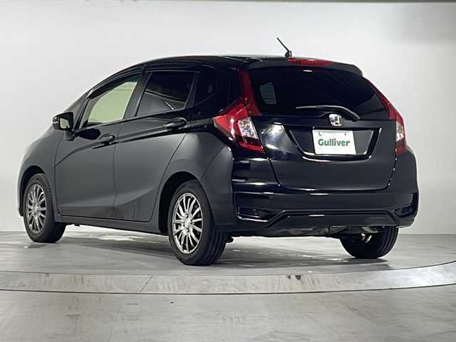 ホンダ フィット 13G L ホンダセンシング 広島県 2018(平30)年 6.8万km クリスタルブラックパール 禁煙/ホンダセンシング/●衝突軽減ブレーキ〈CMBS〉/●誤発進抑制機能/●歩行者事故低減ステアリング/●路外逸脱抑制機能/●ACC〈アダプティブ・クルーズ・コントロール〉/●LKAS〈車線維持支援システム〉/●先行車発進お知らせ機能/●標識認識機能/社外ナビ（CN-RE04D）/・フルセグ/CD/DVD/Bluetooth/SD/バックカメラ/ステアリングスイッチ/オートライト/Fパッケージ/・IRカット/UVカットガラス/・LEDドアウィンカーミラー/・オートリトラミラー/Lパッケージ/・LEDヘッドライト〈インラインタイプ〉/・LEDフォグライト/・前席用i-サイドエアバッグ＋サイドカーテンエアバッグ/セキュリティアラーム/オートエアコン/前後ドライブレコーダー（ユピテル）/ETC/社外15インチアルミホイール