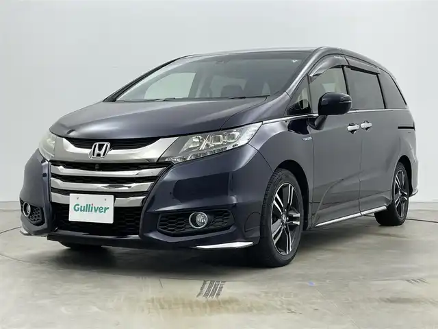 ホンダ オデッセイ ハイブリッド アブソルートセンシングEXパック 岡山県 2017(平29)年 6.9万km プレミアムヴィーナスブラックP 純正ナビ(3HU3)/【Bluetooth/フルセグTV/CD/DVD/HDMI】/全方位カメラ/１００Ｖ電源/両側パワースライドドア/衝突軽減ブレーキ/レーダークルーズコントロール/ハーフレザーシート/ブラインドスポットモニター/運転席パワーシート/ビルトインＥＴＣ/ＬＥＤヘッドライト　/フォグランプ/純正17インチアルミホイール/スマートキー×2