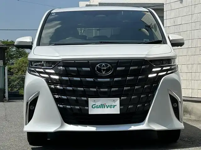 トヨタ アルファード Z 埼玉県 2024(令6)年 0.7万km プラチナホワイトパールマイカ ワンオーナー/トヨタ純正14インチコネクティッドナビ/フルセグ/BT/Miracast/HDMI/AM/FM/パノラミックビューモニター/左右独立ムーンルーフ/ユニバーサルステップ/13インチ有機EL後席モニター/デジタルインナーミラー/AC100V/置くだけ充電/ビルトインETC2.0/前後ドライブレコーダー/両側パワースライドドア/パワーバックドア/PCS/RSA/LDA/ACC/PKSB/BSM/RCTA/LEDオートライト/フォグランプ/オートハイビーム/ウッドコンビステアリング/ステアリングスイッチ/ステアリングヒーター/エア-シート/シートヒーター/メモリ付きパワーシート/nanoe/純正フロアマット/スマートキー/プッシュスタート