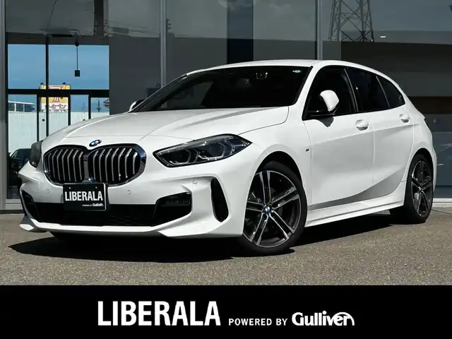 ＢＭＷ １１８ｄ Mスポーツ EDジョイ+ 富山県 2020(令2)年 1.4万km 白 HDDナビ/Bluetooth接続/AM/FMラジオ/App-conect/MirrorLink/バックカメラ/D席メモリ付きパワーシート/アイドリングストップ/パワーバックドア/純正前後ドラレコ/ACC/ETC/ワイヤレス充電/プッシュスタート/アドブルー/パークアシスト/横滑り防止/コーナーセンサー/純正18インチAW