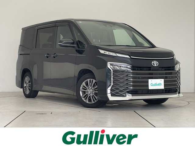 トヨタ ヴォクシー S－G 愛知県 2022(令4)年 2.6万km グリッターブラックガラスフレーク トヨタセーフティセンス/快適利便パッケージ/純正10.5型ディスプレイオーディオナビ/フリップダウンモニター/両側パワースライドドア/レーダークルーズコントロール/シートヒーター/バックカメラ/コーナーセンサー/純正アルミホイール/ETC2.0/LEDヘッドライト/リアオートエアコン/オートマチックハイビーム/ドライブレコーダー/衝突軽減システム/フルセグ/CD DVD/Bluetooth/ステアリングスイッチ/スマートキー/プッシュスタート