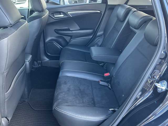 ホンダ シャトル ハイブリッド Z 茨城県 2017(平29)年 1.5万km ミッドナイトブルービームM ワンオーナー/純正ディーラーナビ/　　【ワンセグ、BT、CD、DVD】/バックカメラ/あんしんパッケージ/コンフォートビューパッケージ/前後コーナーセンサー/ハーフレザーシート/純正16インチAW/LEDオートライト/純正フロアマット/プッシュスタート/スマートキー/ETC/本革巻ステアリング/LED室内灯/プラズマクラスター付きAC/スーパーUVカットフロントガラス/IRカットフロントウィンドウ、ドアガラス/ステンレス製スポーツペダル/パドルシフト/前後シートヒーター