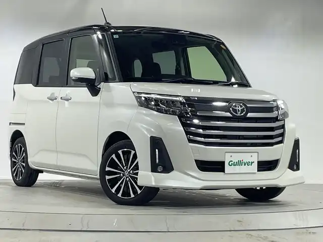 トヨタ ルーミー カスタムG－T 神奈川県 2025(令7)年 0.1千km ブラックマイカメタリック/パールホワイト2トーン 純正9インチディスプレイオーディオ/AM/FM/フルセグ/Bluetooth/・Apple Carplay/AndroidAut対応/スマートアシスト/・衝突被害軽減ブレーキ/・衝突警報機能/・車線逸脱警報機能/・路外逸脱警報機能/・ふらつき警報/・ブレーキ制御付き誤発進抑制機能/・先行者発進お知らせ機能/・アダプティブドライビングビーム/・サイドビューランプ/・コーナーセンサー/・標識認識機能/・アダプティブクルーズコントロール/パノラミックビューパッケージ/・パノラミックビューモニター/・ステアリングスイッチ(ビューモニター操作)/フルフラットシート/LEDヘッドライト/両側パワースライドドア/D+N席シートヒーター/スペアキー/アイドリングストップ/取扱説明書