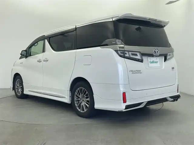 トヨタ ヴェルファイア ハイブリット エグゼクティブ ラウンジ Z 富山県 2018(平30)年 11.8万km ホワイトパールクリスタルシャイン JBLサウンド/サンルーフ/モデリスタエアロ/純正ナビ（AM/FM/DVD/BT/USB/フルセグ）/全方位カメラ/後席モニター/ブラインドスポットモニター/レザーシート/シートヒーター/エアシート/パワーシート/D席メモリシート/ハンドルヒーター/衝突被害軽減システム/レーダークルーズコントロール/レーンキープアシスト/コーナーセンサー/横滑り防止装置/オートLEDライト/オートマチックハイビーム/純正アルミホイール/純正フロアマット