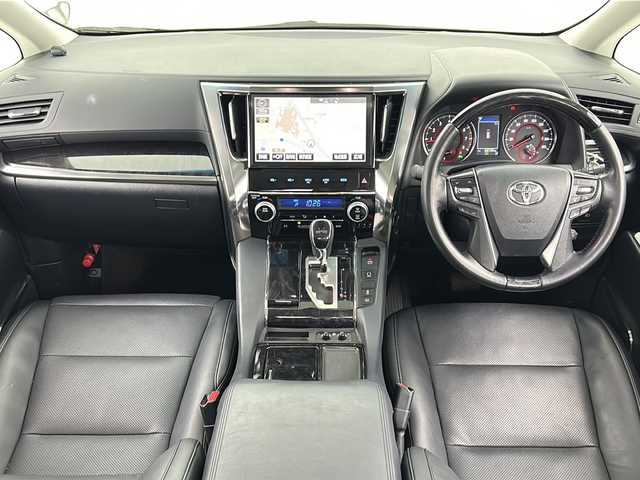 トヨタ ヴェルファイア Z Gエディション 宮城県 2018(平30)年 6.9万km ホワイトパールクリスタルシャイン 禁煙車/ツインムーンルーフ/純正フリップダウンモニター/両側パワースライドドア/レザーシート/トヨタセーフティセンス/・プリクラッシュセーフティ/・レーントレーシングアシスト/・レーダークルーズコントロール/・オートハイビーム/・ロードサインアシスト/純正10型ナビ/・CD・DVD・BT・SD・HDMI/フルセグTV/バックカメラ/前席パワーシート/前席シートヒーター/前席エアーシート/D席シートメモリー/革巻きステアリング/ステアリングスイッチ/パワーバックドア/電動パーキングブレーキ/AUTOHOLD/純正ドライブレコーダー（フロント）/LEDヘッドライト/LEDフォグライト/純正フロアマット/純正ドアバイザー/純正18インチアルミホイール/プッシュスタート/スマートキー×2/横滑り防止装置/ビルドインETC2.0/ロールサンシェード