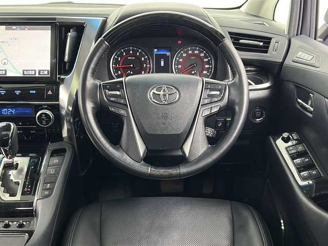 トヨタ ヴェルファイア Z Gエディション 宮城県 2018(平30)年 6.9万km ホワイトパールクリスタルシャイン 禁煙車/ツインムーンルーフ/純正フリップダウンモニター/両側パワースライドドア/レザーシート/トヨタセーフティセンス/・プリクラッシュセーフティ/・レーントレーシングアシスト/・レーダークルーズコントロール/・オートハイビーム/・ロードサインアシスト/純正10型ナビ/・CD・DVD・BT・SD・HDMI/フルセグTV/バックカメラ/前席パワーシート/前席シートヒーター/前席エアーシート/D席シートメモリー/革巻きステアリング/ステアリングスイッチ/パワーバックドア/電動パーキングブレーキ/AUTOHOLD/純正ドライブレコーダー（フロント）/LEDヘッドライト/LEDフォグライト/純正フロアマット/純正ドアバイザー/純正18インチアルミホイール/プッシュスタート/スマートキー×2/横滑り防止装置/ビルドインETC2.0/ロールサンシェード