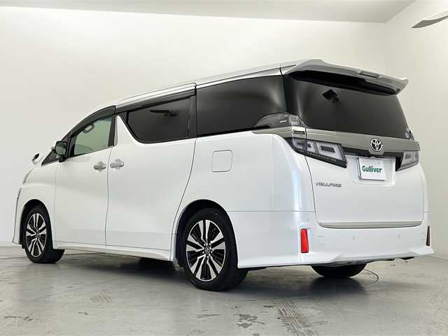 トヨタ ヴェルファイア Z Gエディション 宮城県 2018(平30)年 6.9万km ホワイトパールクリスタルシャイン 禁煙車/ツインムーンルーフ/純正フリップダウンモニター/両側パワースライドドア/レザーシート/トヨタセーフティセンス/・プリクラッシュセーフティ/・レーントレーシングアシスト/・レーダークルーズコントロール/・オートハイビーム/・ロードサインアシスト/純正10型ナビ/・CD・DVD・BT・SD・HDMI/フルセグTV/バックカメラ/前席パワーシート/前席シートヒーター/前席エアーシート/D席シートメモリー/革巻きステアリング/ステアリングスイッチ/パワーバックドア/電動パーキングブレーキ/AUTOHOLD/純正ドライブレコーダー（フロント）/LEDヘッドライト/LEDフォグライト/純正フロアマット/純正ドアバイザー/純正18インチアルミホイール/プッシュスタート/スマートキー×2/横滑り防止装置/ビルドインETC2.0/ロールサンシェード