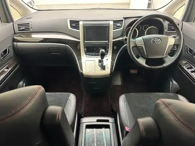 トヨタ ヴェルファイア 2．4Z ゴールデンアイズⅡ 兵庫県 2014(平26)年 7万km ホワイトパールクリスタルシャイン 純正SDナビ(CD/DVD/SD/Bluetooth/フルセグ)/純正フリップダウンモニター/バックカメラ/コーナーセンサー/両側パワースライドドア/パワーバックドア/クルーズコントロール/ハーフレザーシート/オットマン/純正18インチアルミホイール/純正フロアマット/ビルトインETC/HIDヘッドライト/ドライブレコーダー/オートライト