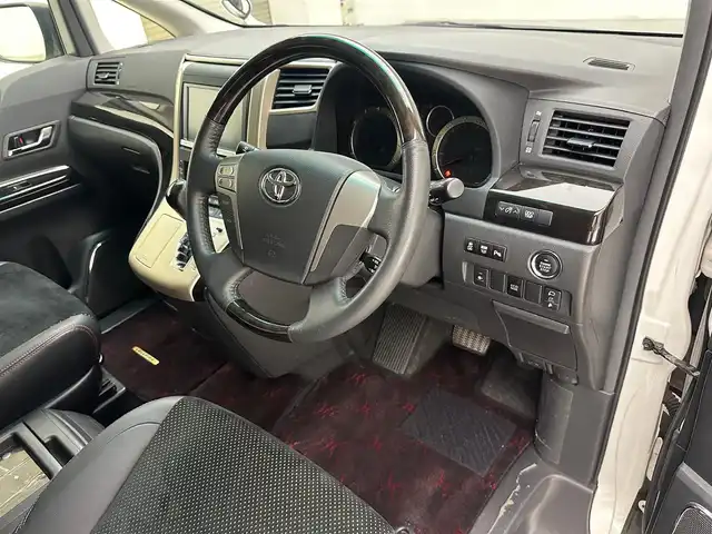 トヨタ ヴェルファイア 2．4Z ゴールデンアイズⅡ 兵庫県 2014(平26)年 7万km ホワイトパールクリスタルシャイン 純正SDナビ(CD/DVD/SD/Bluetooth/フルセグ)/純正フリップダウンモニター/バックカメラ/コーナーセンサー/両側パワースライドドア/パワーバックドア/クルーズコントロール/ハーフレザーシート/オットマン/純正18インチアルミホイール/純正フロアマット/ビルトインETC/HIDヘッドライト/ドライブレコーダー/オートライト