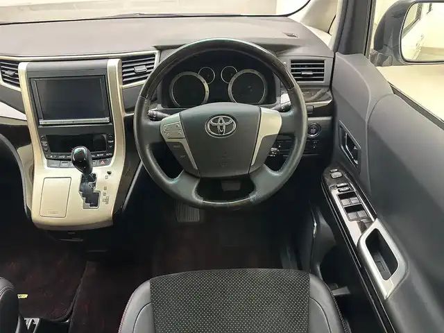 トヨタ ヴェルファイア 2．4Z ゴールデンアイズⅡ 兵庫県 2014(平26)年 7万km ホワイトパールクリスタルシャイン 純正SDナビ(CD/DVD/SD/Bluetooth/フルセグ)/純正フリップダウンモニター/バックカメラ/コーナーセンサー/両側パワースライドドア/パワーバックドア/クルーズコントロール/ハーフレザーシート/オットマン/純正18インチアルミホイール/純正フロアマット/ビルトインETC/HIDヘッドライト/ドライブレコーダー/オートライト