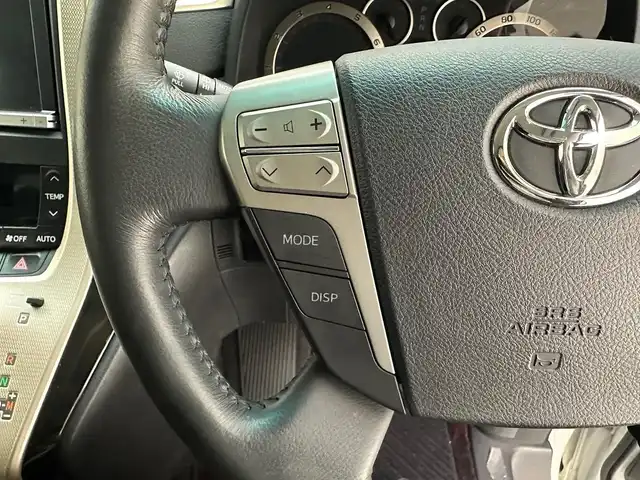 トヨタ ヴェルファイア 2．4Z ゴールデンアイズⅡ 兵庫県 2014(平26)年 7万km ホワイトパールクリスタルシャイン 純正SDナビ(CD/DVD/SD/Bluetooth/フルセグ)/純正フリップダウンモニター/バックカメラ/コーナーセンサー/両側パワースライドドア/パワーバックドア/クルーズコントロール/ハーフレザーシート/オットマン/純正18インチアルミホイール/純正フロアマット/ビルトインETC/HIDヘッドライト/ドライブレコーダー/オートライト