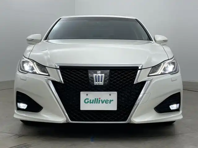 トヨタ クラウン ハイブリッド アスリートG 岡山県 2016(平28)年 14.3万km ホワイトパールクリスタルシャイン サンルーフ/純正ナビ/【Bluetooth/CD/DVD/フルセグTV】/黒合皮シート/前席シートヒーター/前席エアシート/前席パワーシート/シートメモリー機能/ステアリングヒーター/LEDヘッドライト/レーダークルーズコントロール/ビルトインETC/ブラインドスポットモニター/ステアリングリモコン/純正ドライブレコーダー（前）/オートライト/ハイビーム/電動ステアリング調整/純正フロアマット/バイザー/バックカメラ/エアコンスイング機能/プッシュスタート/スマートキー