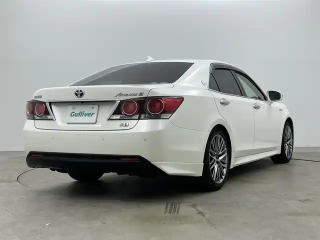 トヨタ クラウン ハイブリッド アスリートG 岡山県 2016(平28)年 14.3万km ホワイトパールクリスタルシャイン サンルーフ/純正ナビ/【Bluetooth/CD/DVD/フルセグTV】/黒合皮シート/前席シートヒーター/前席エアシート/前席パワーシート/シートメモリー機能/ステアリングヒーター/LEDヘッドライト/レーダークルーズコントロール/ビルトインETC/ブラインドスポットモニター/ステアリングリモコン/純正ドライブレコーダー（前）/オートライト/ハイビーム/電動ステアリング調整/純正フロアマット/バイザー/バックカメラ/エアコンスイング機能/プッシュスタート/スマートキー