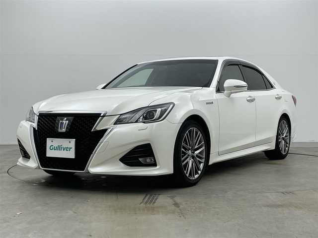 トヨタ クラウン ハイブリッド アスリートG 岡山県 2016(平28)年 14.3万km ホワイトパールクリスタルシャイン サンルーフ/純正ナビ/【Bluetooth/CD/DVD/フルセグTV】/黒合皮シート/前席シートヒーター/前席エアシート/前席パワーシート/シートメモリー機能/ステアリングヒーター/LEDヘッドライト/レーダークルーズコントロール/ビルトインETC/ブラインドスポットモニター/ステアリングリモコン/純正ドライブレコーダー（前）/オートライト/ハイビーム/電動ステアリング調整/純正フロアマット/バイザー/バックカメラ/エアコンスイング機能/プッシュスタート/スマートキー