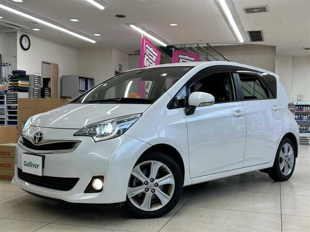 トヨタ ラクティス 東京都 2014(平26)年 12.4万km ホワイトパールクリスタルシャイン 純正ディーラーナビ(NSCP-W62)/(FM/AM/BT/ワンセグTV)/バックカメラ/電動格納ミラー/ドアバイザー/純正フロアマット/横滑り防止/ETC/革巻きステアリング/クルーズコントロール/オートライト/フォグランプ/HID/プライバシーガラス/前方ドライブレコーダー/ISOFIX