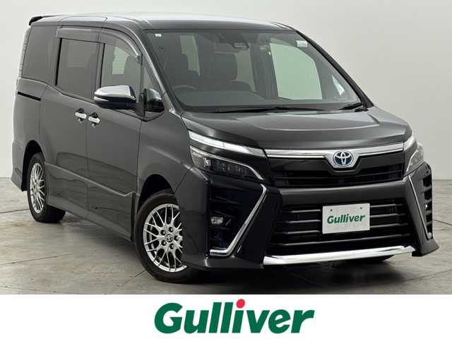 トヨタ ヴォクシー ハイブリッド ZS 煌Ⅲ 福岡県 2021(令3)年 5.5万km イナズマスパーキングブラックガラスフレーク 純正ナビ／フルセグＴＶ　/バックカメラ　/クルーズコントロール　/コーナーセンサー　/衝突軽減ブレーキ　/レーンキープ　/アクセル踏み間違い防止　/両側電動スライドドア　/ハーフレザーシート　/シートヒーター　/ＬＥＤヘッドライト