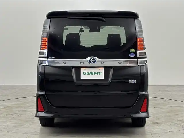 トヨタ ヴォクシー ハイブリッド ZS 煌Ⅲ 福岡県 2021(令3)年 5.5万km イナズマスパーキングブラックガラスフレーク 純正ナビ／フルセグＴＶ　/バックカメラ　/クルーズコントロール　/コーナーセンサー　/衝突軽減ブレーキ　/レーンキープ　/アクセル踏み間違い防止　/両側電動スライドドア　/ハーフレザーシート　/シートヒーター　/ＬＥＤヘッドライト