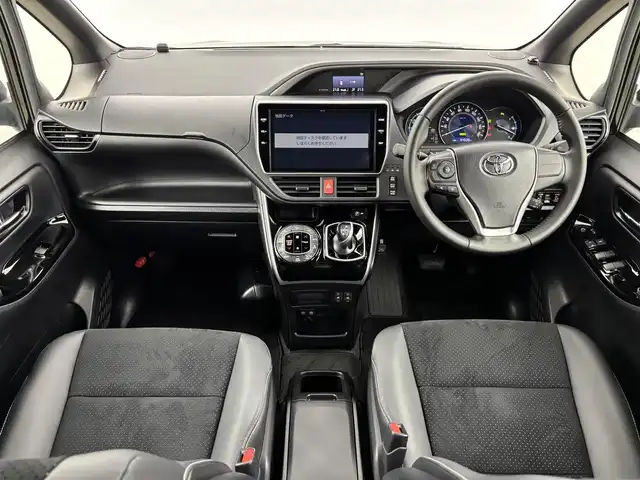 トヨタ ヴォクシー ハイブリッド ZS 煌Ⅲ 福岡県 2021(令3)年 5.5万km イナズマスパーキングブラックガラスフレーク 純正ナビ／フルセグＴＶ　/バックカメラ　/クルーズコントロール　/コーナーセンサー　/衝突軽減ブレーキ　/レーンキープ　/アクセル踏み間違い防止　/両側電動スライドドア　/ハーフレザーシート　/シートヒーター　/ＬＥＤヘッドライト