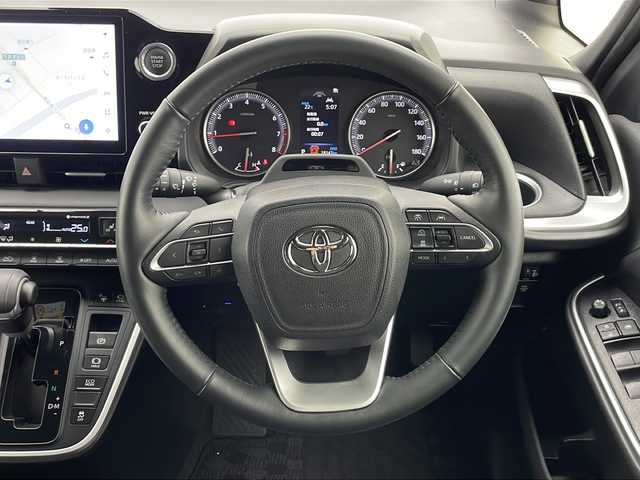 トヨタ ノア S－G 千葉県 2022(令4)年 1.9万km ホワイトパールクリスタルシャイン ワンオーナー/パノラミックビューモニター/ブラインドスポットモニター/クルーズコントロール/10.5インチディスプレイナビ/BT/TV/Miracast/後部14インチフリップダウンモニター/HDMI/ステアリングリモコン/両側パワースライドドア/純正16AW/純正ドアバイザー/リアサンシェード/プッシュスタート/純正ビルトインETC2.0/オートマチックハイビーム/LEDヘッドライト