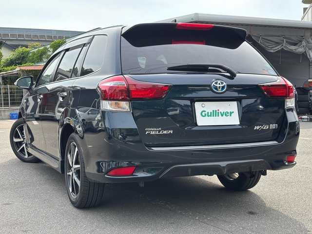 トヨタ カローラ フィールダー ハイブリッドG ダブルバイビー 福岡県 2017(平29)年 10.8万km ブラッキッシュアゲハガラスフレーク ワンオーナー/ディーラーナビ/（AM/FM/CD/DVD/SD/Bluetooth/ワンセグTV）/クルーズコントロール/横滑り防止/レーンキープ/衝突軽減/シートヒーター（運転席/助手席）/オートマチックハイビーム/純正アルミホイール/純正フロアマット/オートライト/フォグランプ/電格ミラー/ECOモード/EVモード/プッシュスタート/保証書/取扱説明書