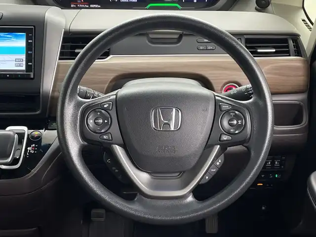 ホンダ フリード ハイブリット G ホンダセンシング 鹿児島県 2021(令3)年 3.3万km プラチナホワイトパール 純正ナビ/（CD/BT）/両側パワースライドドア/ホンダセンシング/バックカメラ/オートクルーズコントロール/LEDヘッドライト/シートヒーター/ロールサンシェイド/オートリトラミラー/スマートキー/ETC/オートライト