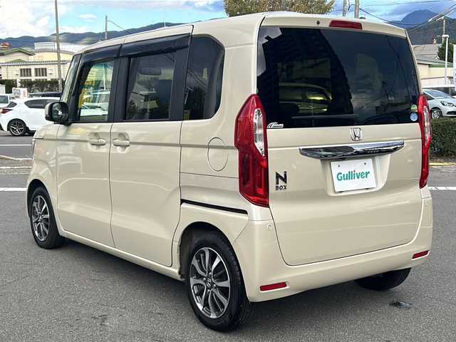 ホンダ Ｎ ＢＯＸ G L ターボ ホンダセンシング 長野県 2019(令1)年 2.7万km プレミアムアイボリーパールⅡ ホンダセンシング/純正Gathersナビ（VXM-195VFi）/FM・AM・DVD・CD・フルセグテレビ/Bluetooth Audio/バックカメラ/純正14インチアルミホイール/レーダークルーズコントロール/両側パワースライドドア/革巻きステアリング/ロールサンシェード/ドライブレコーダー/コーナーセンサー/パドルシフト/LEDヘッドライト/オートライト/プッシュスタート/スマートキー/スペアキー/ドアバイザー/ETC