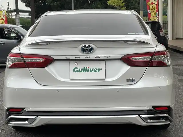トヨタ カムリ G レザーパッケージ 千葉県 2018(平30)年 9.9万km プラチナホワイトパールマイカ モデリスタエアロ（フロント・サイド・リア）/純正ナビ【フルセグ、BT、CD、USB、AUX、SD】/純正18インチアルミホイール/プリクラッシュセーフティ/パーキングアシスト/ブラインドスポットモニター/リヤクロストラフィックアラート/インテリジェントクリアランスソナー/ヘッドアップディスプレイ/ビルトインETC2.0/クルーズコントロール/MT付AT/オートライト/オートハイビーム/前席パワーシート/前席シートヒーター/電動パーキングブレーキ/前ドラレコ（DRY-ST3000）/デュアルエアコン/フルオートPW/純正フロアマット/ドアバイザー
