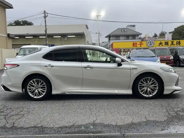 トヨタ カムリ G レザーパッケージ 千葉県 2018(平30)年 9.9万km プラチナホワイトパールマイカ モデリスタエアロ（フロント・サイド・リア）/純正ナビ【フルセグ、BT、CD、USB、AUX、SD】/純正18インチアルミホイール/プリクラッシュセーフティ/パーキングアシスト/ブラインドスポットモニター/リヤクロストラフィックアラート/インテリジェントクリアランスソナー/ヘッドアップディスプレイ/ビルトインETC2.0/クルーズコントロール/MT付AT/オートライト/オートハイビーム/前席パワーシート/前席シートヒーター/電動パーキングブレーキ/前ドラレコ（DRY-ST3000）/デュアルエアコン/フルオートPW/純正フロアマット/ドアバイザー