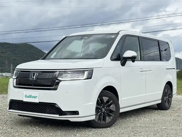 ホンダ ステップワゴン スパーダ eHEV 兵庫県 2023(令5)年 1万km パール 純正ナビ/全方位モニター/フルセグTV/DVD再生可/Bluetooth接続可/ETC/ドラレコ/レーダークルーズコントロール/ブラインドスポットモニター/パドルシフト/パワーバックドア/両側パワースライドドア/ハーフレザーシート/AUTOハイビーム/AUTOライト
