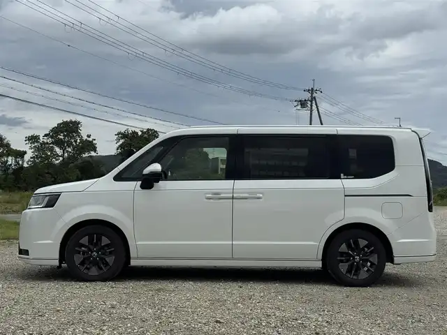 ホンダ ステップワゴン スパーダ eHEV 兵庫県 2023(令5)年 1万km パール 純正ナビ/全方位モニター/フルセグTV/DVD再生可/Bluetooth接続可/ETC/ドラレコ/レーダークルーズコントロール/ブラインドスポットモニター/パドルシフト/パワーバックドア/両側パワースライドドア/ハーフレザーシート/AUTOハイビーム/AUTOライト