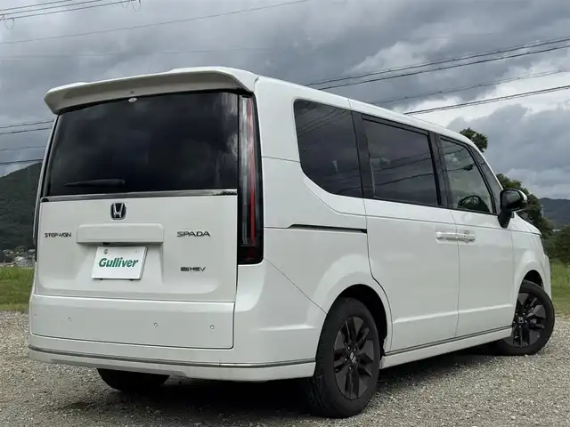ホンダ ステップワゴン スパーダ eHEV 兵庫県 2023(令5)年 1万km パール 純正ナビ/全方位モニター/フルセグTV/DVD再生可/Bluetooth接続可/ETC/ドラレコ/レーダークルーズコントロール/ブラインドスポットモニター/パドルシフト/パワーバックドア/両側パワースライドドア/ハーフレザーシート/AUTOハイビーム/AUTOライト