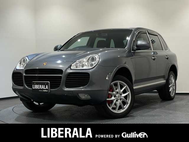 ポルシェ カイエン ターボ 新潟県 2005(平17)年 6.8万km ガンＭ BOSEサウンドシステム/黒革レザーシート/シートヒーター/レッドキャリパー/パドルシフト/クルーズコントロール/コーナーセンサー/バックカメラ/Bluetooth/フルセグTV/純正19インチAW/ETC