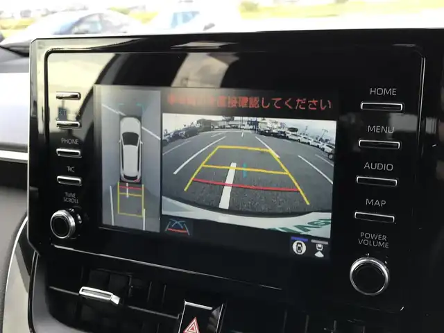 トヨタ カローラ クロス ハイブリッド Z 鳥取県 2021(令3)年 5.5万km プラチナホワイトパールマイカ ４・W・D/ワンオーナー/純正ディスプレイオーディオ/ナビ/BT/USB/Miracast/パノラミックビューモニター/パノラマルーフ/トヨタセーフティセンス/レーンキープアシスト/レーダークルーズコントロール/クリアランスソナー/ブラインドスポットモニター/ビルトインETC/純正ドライブレコーダー（前方）/電動リアゲート/ハーフレザーシート/運転席パワーシート/前席シートヒーター/LEDヘットライト/フォグライト/純正18インチアルミホイール/プッシュエンジンスタート/スマートキー/スタットレスセット積込/（タイヤ溝7部山）