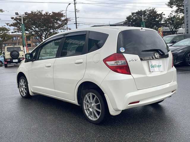 ホンダ フィット G スマートセレクション 鳥取県 2012(平24)年 12.1万km プレミアムホワイトパール メモリナビ/フルセグＴＶ　ＤＶＤ　ＣＤ　Ｂｌｕｅｔｏｏｔｈ　ＳＤ/バックカメラ/ドライブレコーダー/フロアマット/ドアバイザー/スマートキー/取扱説明書/電動格納ミラー/社外１５インチアルミ