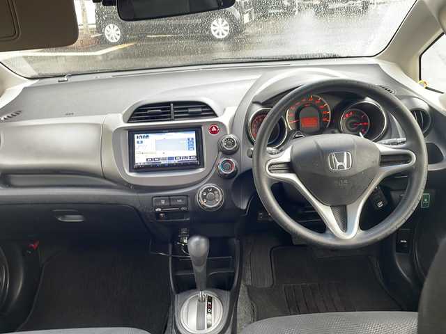 ホンダ フィット G スマートセレクション 鳥取県 2012(平24)年 12.1万km プレミアムホワイトパール メモリナビ/フルセグＴＶ　ＤＶＤ　ＣＤ　Ｂｌｕｅｔｏｏｔｈ　ＳＤ/バックカメラ/ドライブレコーダー/フロアマット/ドアバイザー/スマートキー/取扱説明書/電動格納ミラー/社外１５インチアルミ