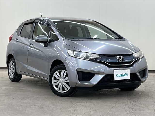 ホンダ フィット 13G Lパッケージ 道央・札幌 2014(平26)年 12.3万km ティンテッドシルバーM /社外AW夏タイヤ積載//社外ミュージックプレイヤー接続(AUX)//CD//寒冷地仕様//横滑り防止装置//アイドリングストップ//4WD//パワーステアリング//パワーウィンドウ//ABS//スマートキー//スペアキー1本//エンジンスタートボタン//オートエアコン//ダブルエアバック//社外フロアマット