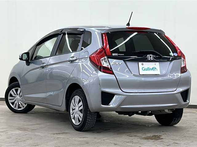 ホンダ フィット 13G Lパッケージ 道央・札幌 2014(平26)年 12.3万km ティンテッドシルバーM /社外AW夏タイヤ積載//社外ミュージックプレイヤー接続(AUX)//CD//寒冷地仕様//横滑り防止装置//アイドリングストップ//4WD//パワーステアリング//パワーウィンドウ//ABS//スマートキー//スペアキー1本//エンジンスタートボタン//オートエアコン//ダブルエアバック//社外フロアマット