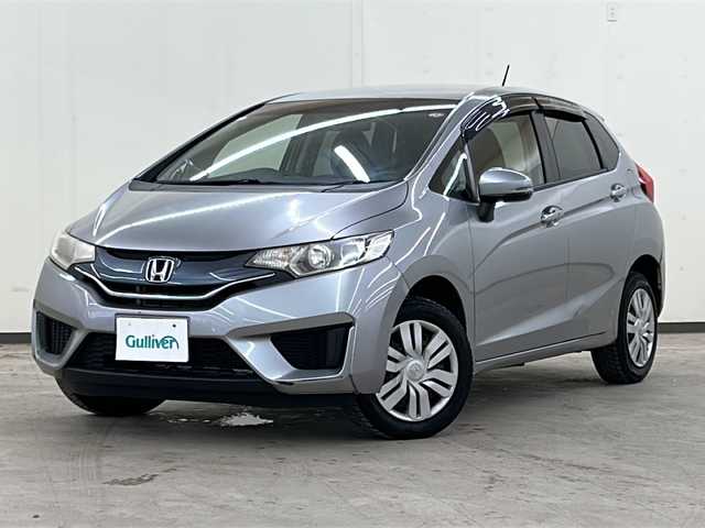 ホンダ フィット 13G Lパッケージ 道央・札幌 2014(平26)年 12.3万km ティンテッドシルバーM /社外AW夏タイヤ積載//社外ミュージックプレイヤー接続(AUX)//CD//寒冷地仕様//横滑り防止装置//アイドリングストップ//4WD//パワーステアリング//パワーウィンドウ//ABS//スマートキー//スペアキー1本//エンジンスタートボタン//オートエアコン//ダブルエアバック//社外フロアマット