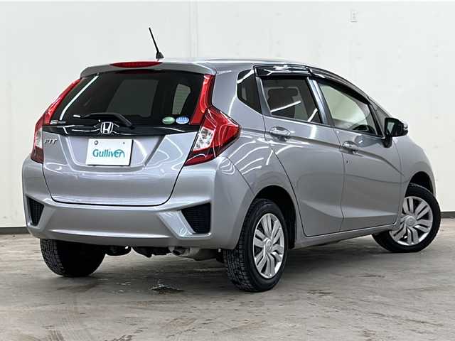 ホンダ フィット 13G Lパッケージ 道央・札幌 2014(平26)年 12.3万km ティンテッドシルバーM /社外AW夏タイヤ積載//社外ミュージックプレイヤー接続(AUX)//CD//寒冷地仕様//横滑り防止装置//アイドリングストップ//4WD//パワーステアリング//パワーウィンドウ//ABS//スマートキー//スペアキー1本//エンジンスタートボタン//オートエアコン//ダブルエアバック//社外フロアマット